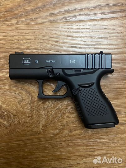 Игрушечный пистолет металлический