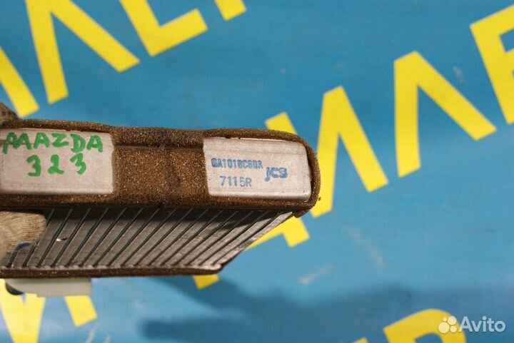 Радиатор печки Mazda 323F BA