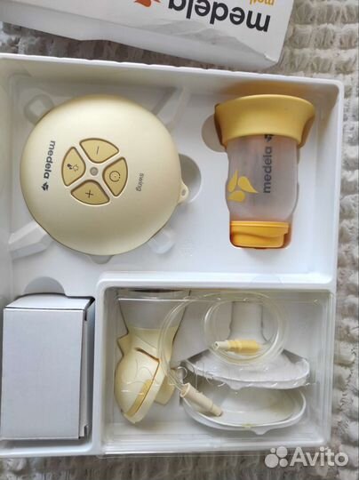 Молокоотсос medela электрический