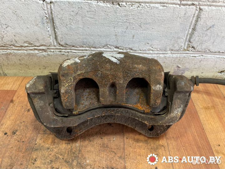 Суппорт тормозной передний левый Peugeot 4007 2009