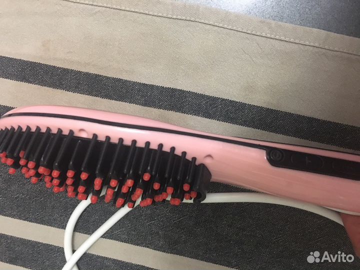 Расчёска, выпрямляющая волосы