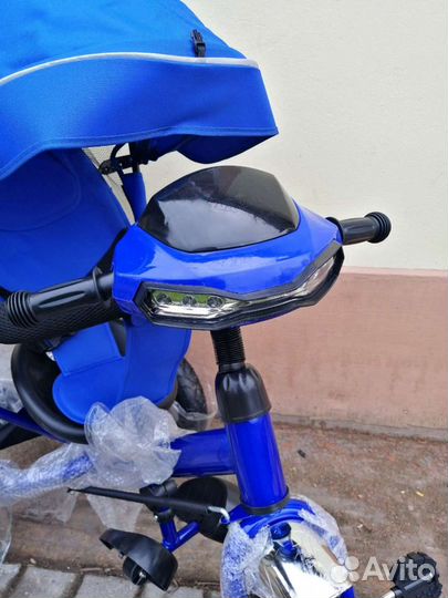 Трехколесный велосипед с ручкой