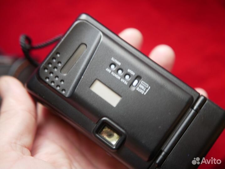 Olympus AM-100 в чехле. Топовый компакт