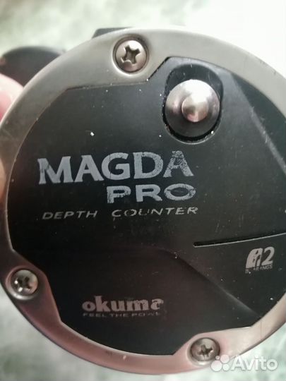 Катушка рыболовная инерционная