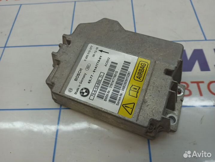 Блок управления AIR BAG BMW X5 (E70) 65779141776