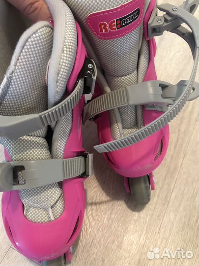 Роликовые коньки