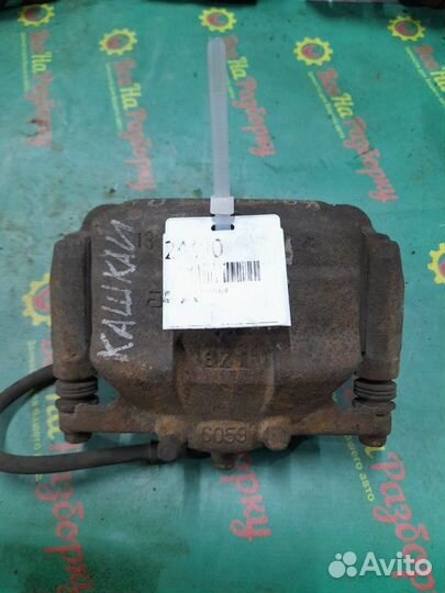 Суппорт передний левый Nissan Qashqai