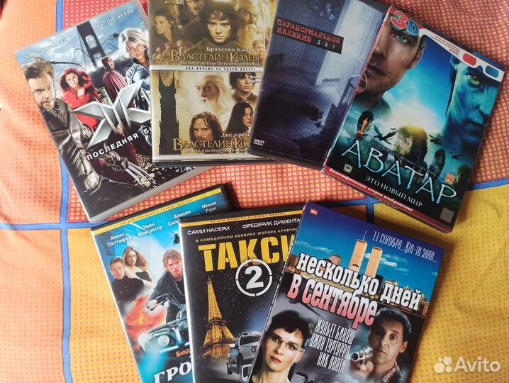 Диски DVD с фильмами и сериалами