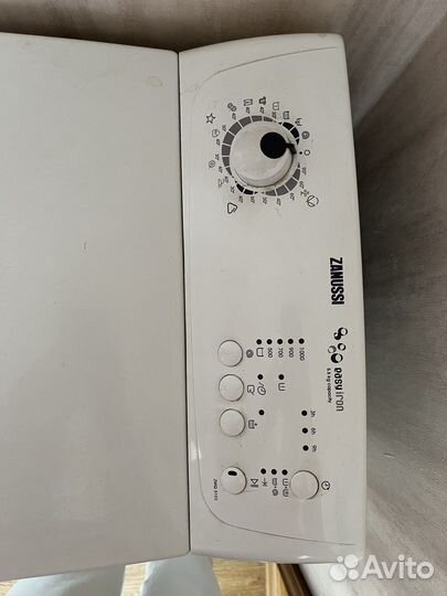 Стиральная машинка с вертикальной загрузкой