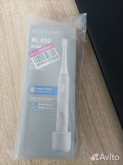 Электрическая зубная щетка