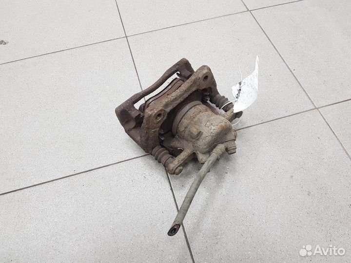 Суппорт тормозной передний правый Nissan Note