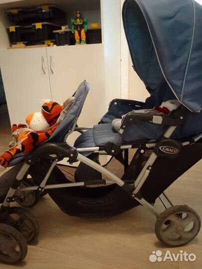 Коляска для двойни погодок