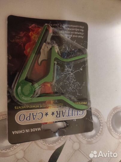 Каподастр для гитары