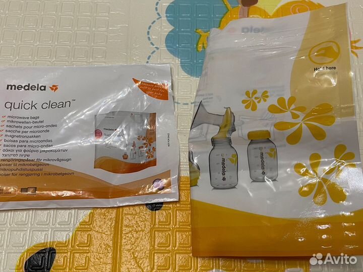 Молокоотсос Medela swing + calma