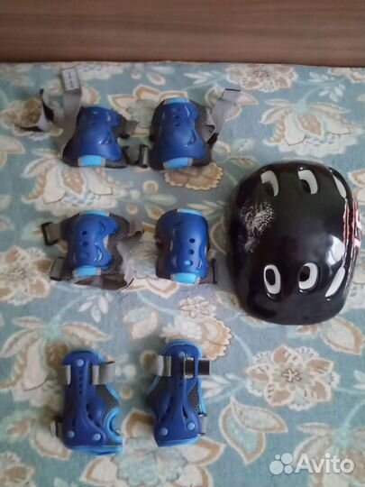 Коньки роликовые