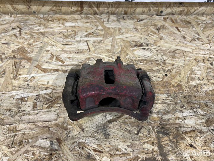 Суппорт тормозной перед левый Hyundai Elantra XD