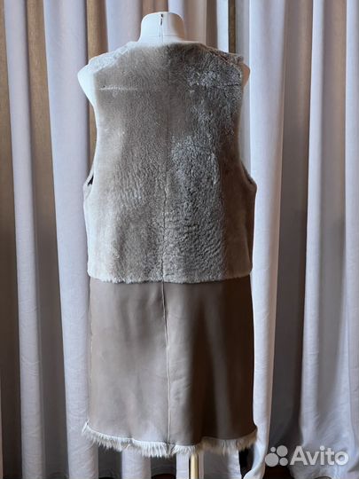 Жилетка меховая женская