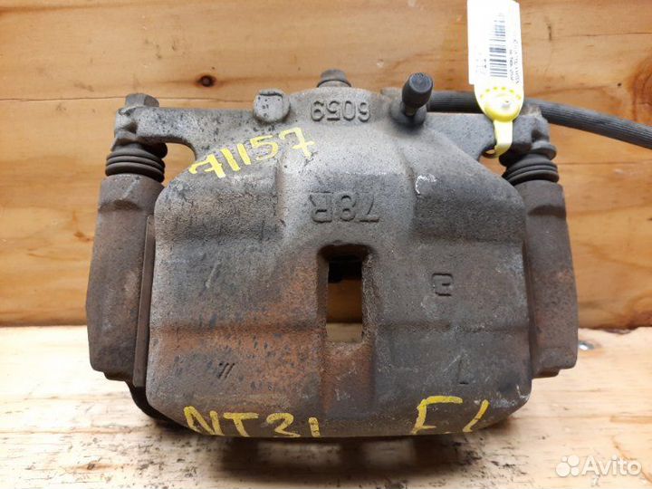 Суппорт лев. перед. nissan X-trail