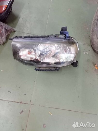 Фара nissan cube