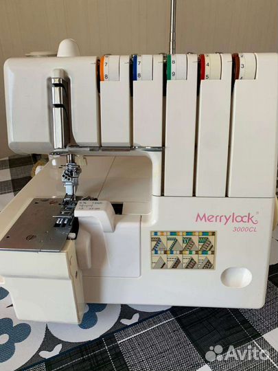 Коверлок merrylock