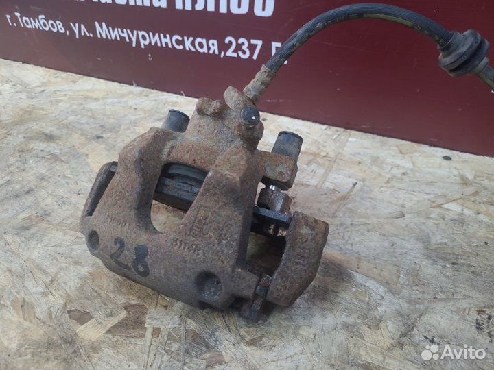 Суппорт тормозной передний левый Renault Sandero