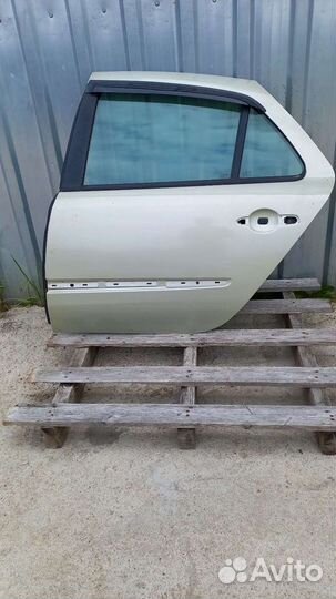 Дверь задняя, левая. В лагуна 2