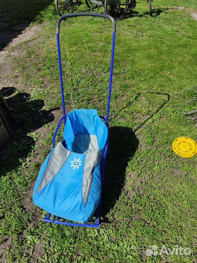 Детские санки с колесами и пологом