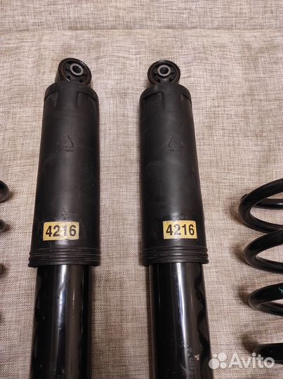 Задние амортизаторы пружины нивомат Каптива Антара