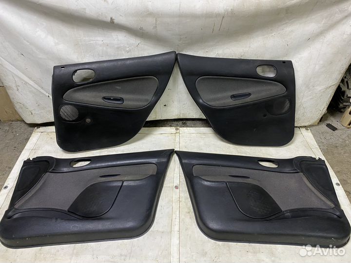 Дверные карты Peugeot 206