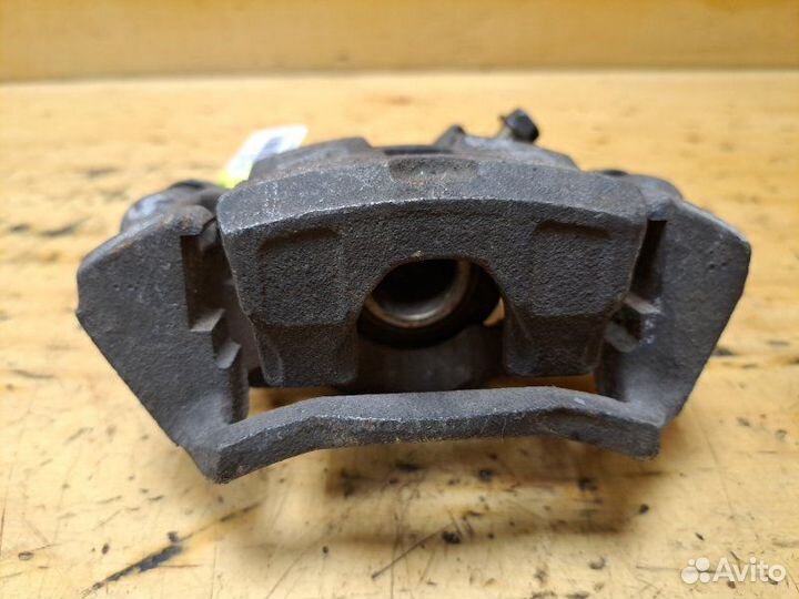 Суппорт задний левый Nissan Laurel HC35 RB20DE