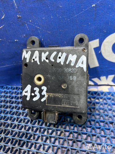 Моторчик заслонок отопителя Nissan Maxima A33