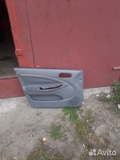 Обшивка на левую дверь chevrolet lacetti