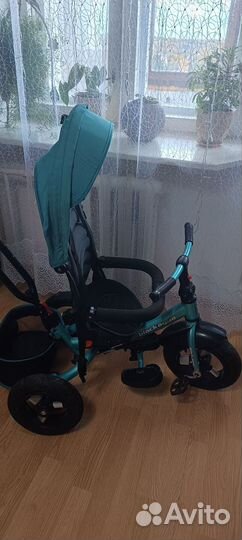 Трехколесный велосипед с ручкой