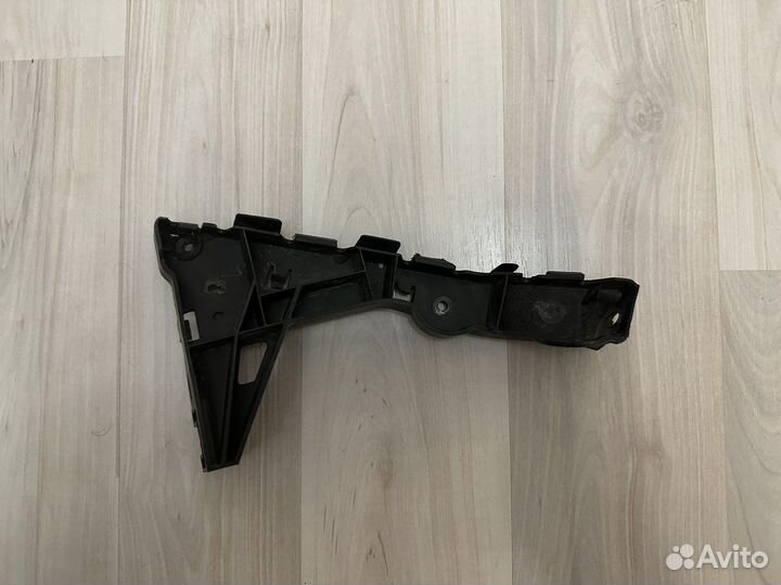 Кронштейн переднего бампера Opel Astra H (левый)