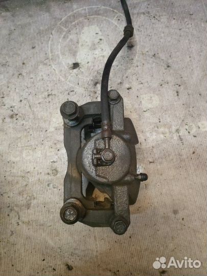 Суппорт тормозной передний правый Nissan X-Trail