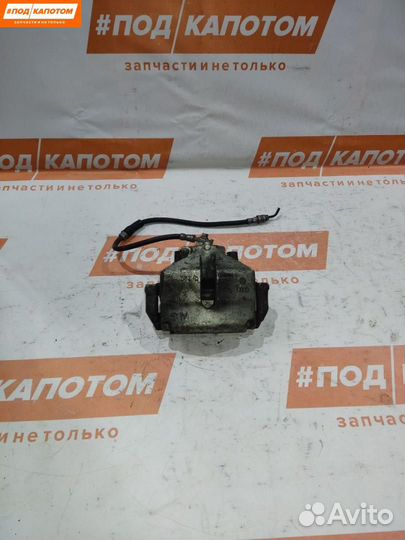 Суппорт тормозной передний правый Volkswagen Caddy