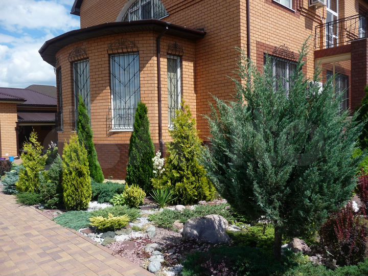 Коттедж 338 м² на участке 10 сот.