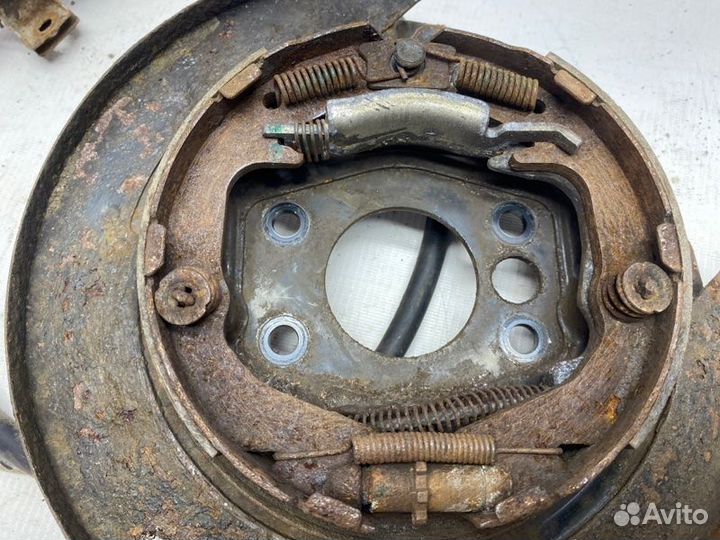 Механизм ручного тормоза задний левый Mitsubishi