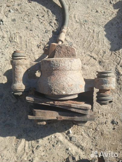 Суппорт тормозной передний левый Geely Otaka