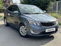 Kia Rio 1.6 AT, 2013, 128 000 км, с пробегом, цена 1 055 000 руб.