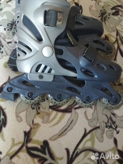 Роликовые коньки