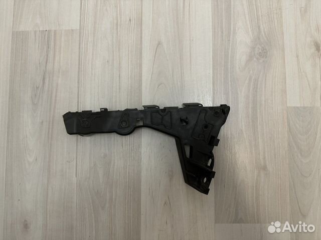 Кронштейн переднего бампера Opel Astra H (левый)