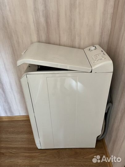 Стиральная машинка с вертикальной загрузкой