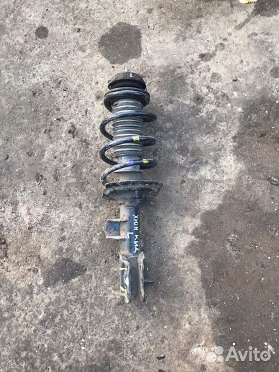 Стойка амортизатора передняя левая Kia Rio, III