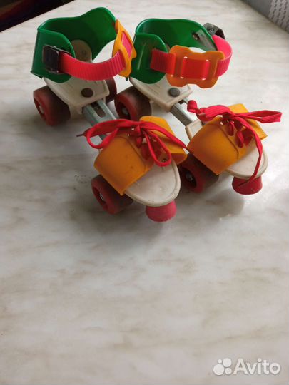 Роликовые коньки