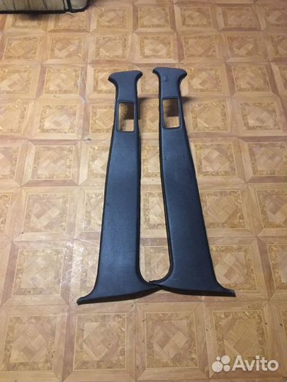 Обшивки центральных стоик BMW Е34