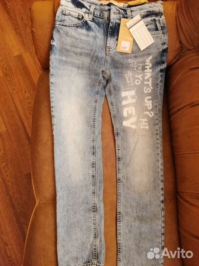 Джинсы новые