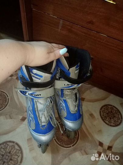 Роликовые коньки