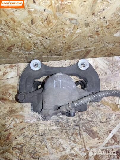 Суппорт тормозной передний левый Opel Astra J