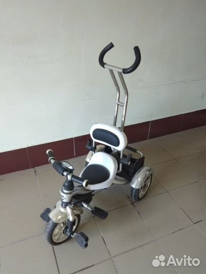 Трехколесный велосипед с ручкой